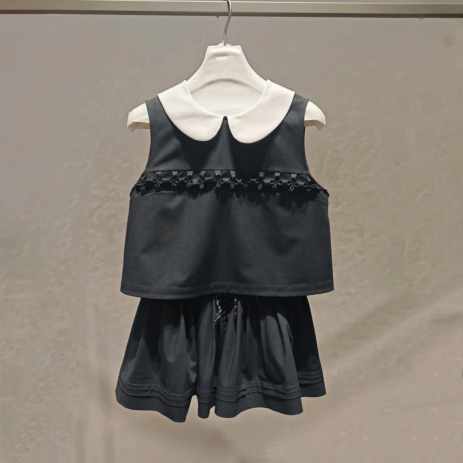 Spring New Arrival Japanese Style Doll Collar Sleeveless Vest Top And Half Skirt Set Women's High Waist Breathable Fashion Set
Spring New Arrival Japanese Style Doll Collar Sleeveless Vest Top And Half Skirt Set Women's High Waist Breathable Fashion Set