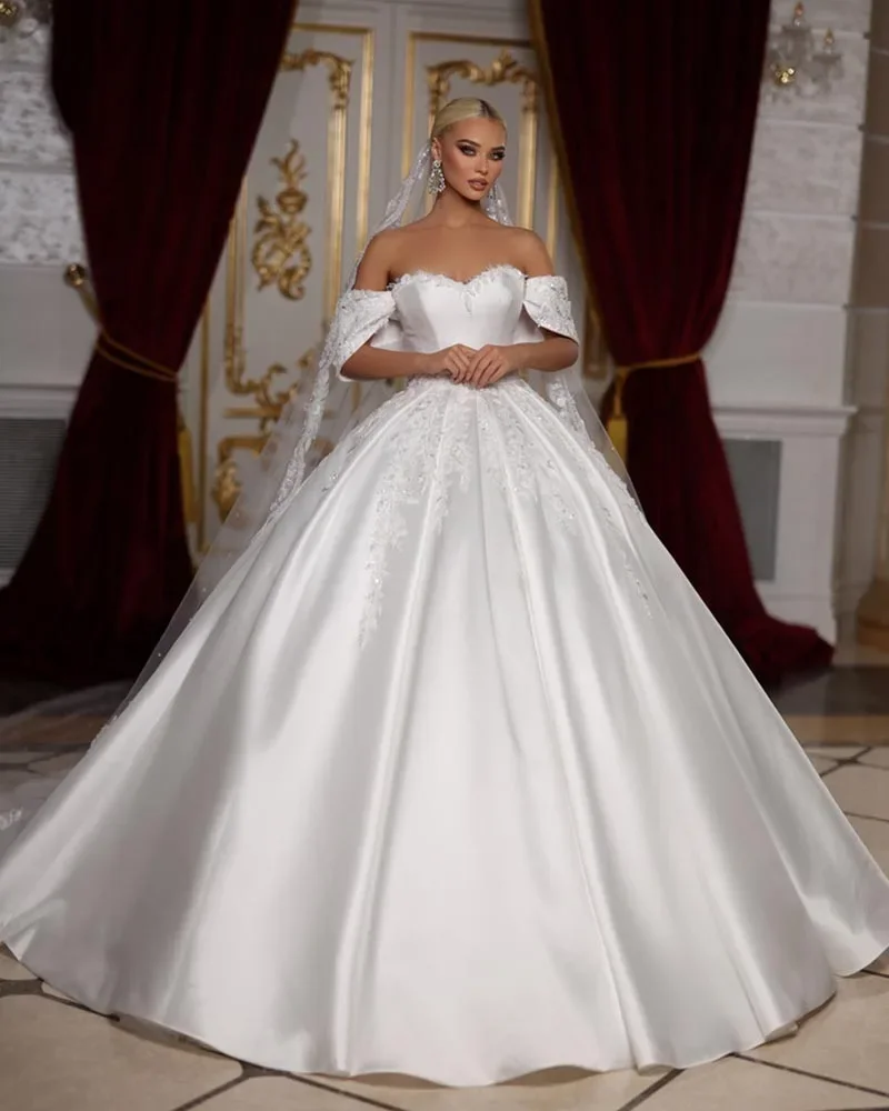 Flavinke Customized Sweetheart Neck Lace Up Back Short Sleeve Beading Sequins Satin Ball Gown Wedding Dresses Vestido De Noiva
Flavinke Customized Sweetheart Neck Lace Up Back Short Sleeve Beading Sequins Satin Ball Gown Wedding Dresses Vestido De Noiva
