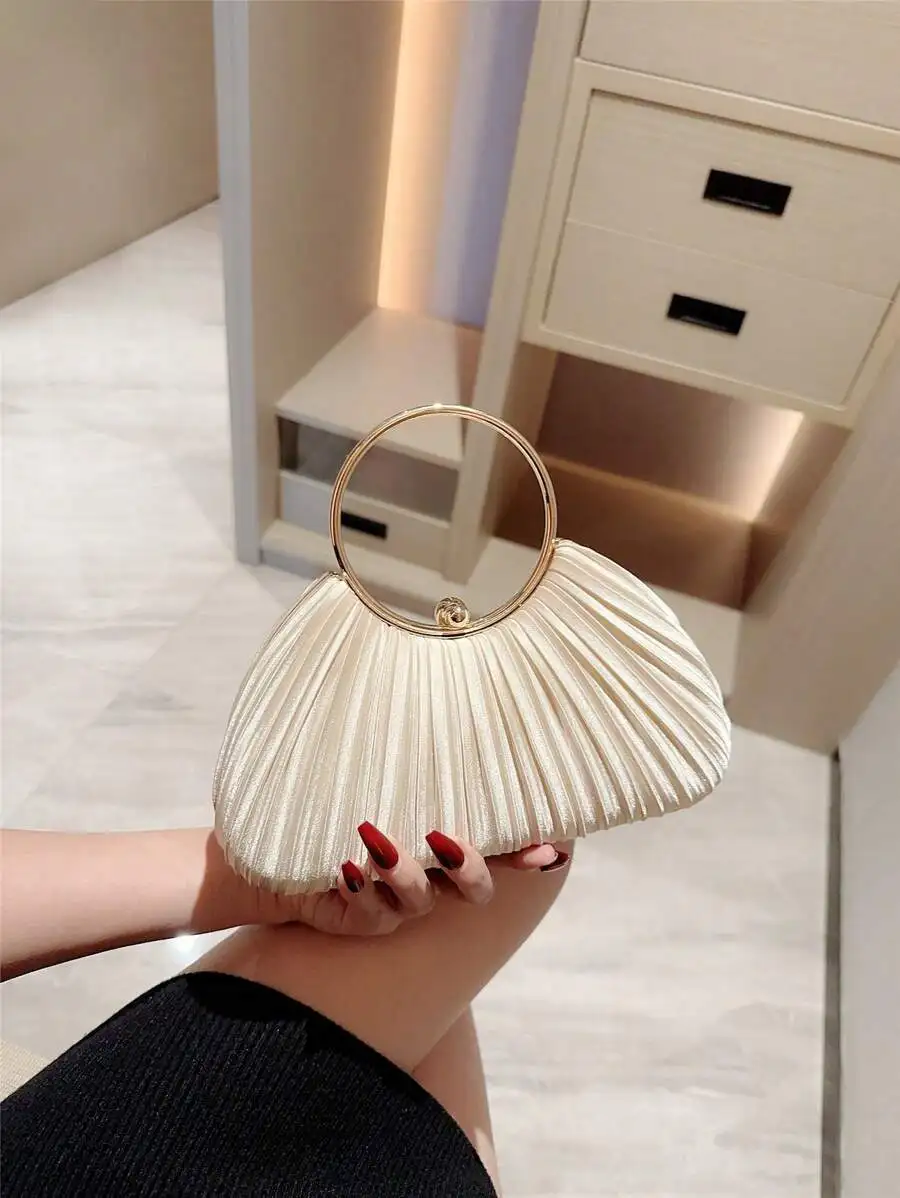 Elegant Pleated Clutch Handbag With Circular Ring Handle For Evening Party
Elegant Pleated Clutch Handbag With Circular Ring Handle For Evening Party