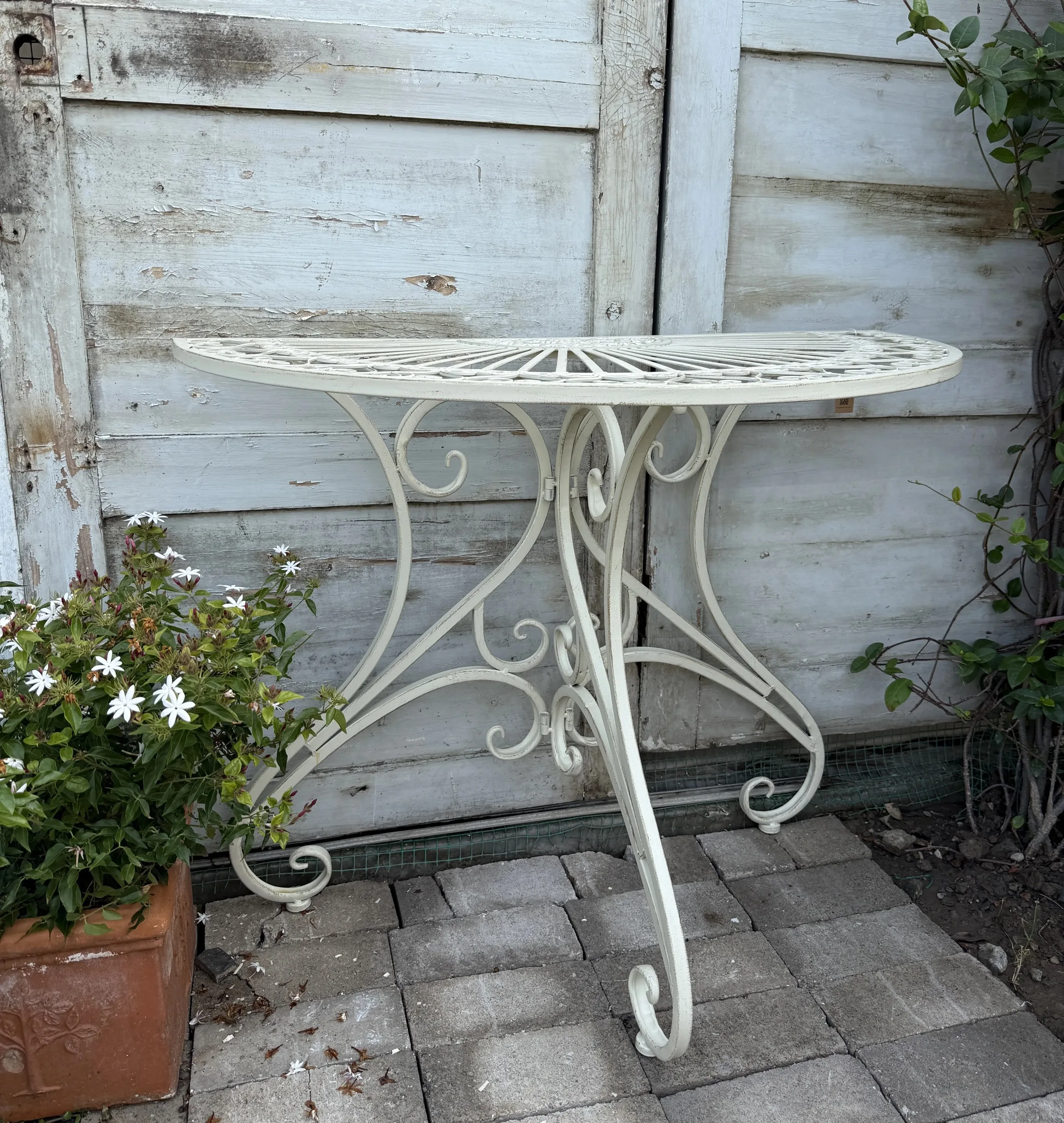 Vintage Metal Garden Table, Decorative Scrollwork Design, Half Moon Shape, Outdoor Patio Furniture with Detachable Legs
Vintage Metal Garden Table, Decorative Scrollwork Design, Half Moon Shape, Outdoor Patio Furniture with Detachable Legs