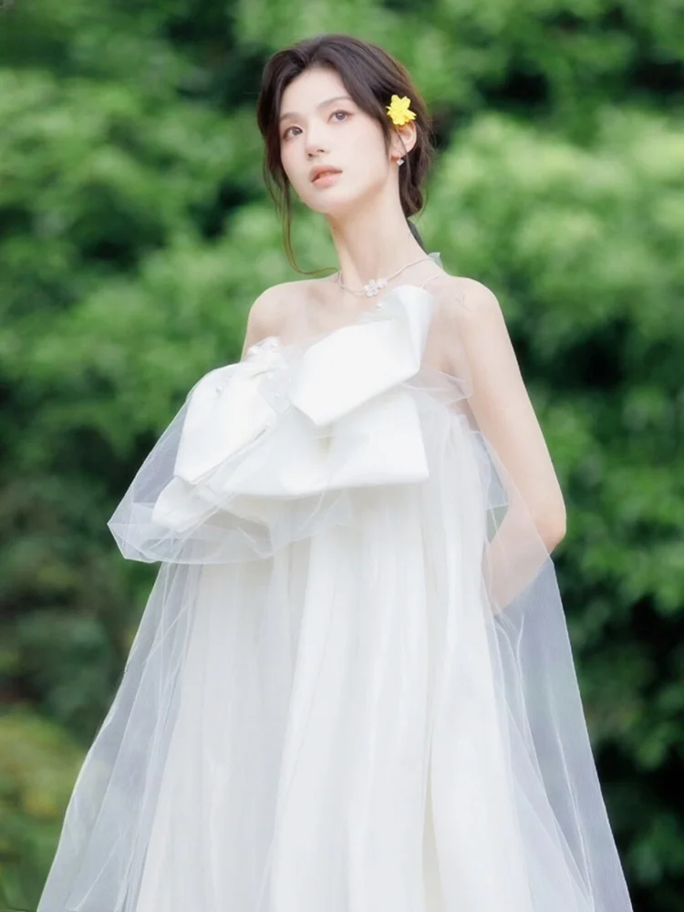 Новое свадебное платье 2025 года с завышенной талией в корейском стиле для выездной церемонии на открытом воздухе, для беременных, с жемчужной отделкой, без рукавов
Новое свадебное платье 2025 года с завышенной талией в корейском стиле для выездной церемонии на открытом воздухе, для беременных, с жемчужной отделкой, без рукавов