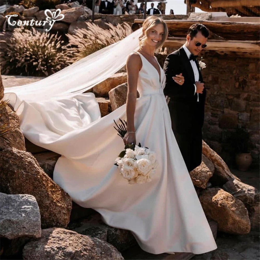 Satin Wedding Dress for Women 2024 High Slit Deep V Neck Backless A-Line Rustic Bride Dresses Bridal Gowns Robe de Mariee
Satin Wedding Dress for Women 2024 High Slit Deep V Neck Backless A-Line Rustic Bride Dresses Bridal Gowns Robe de Mariee