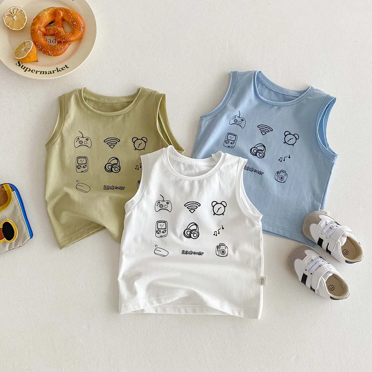 Children's Summer Thin Sleeveless T-shirt, Cute Cartoon Printed Vest for Boys and Girls, Versatile Shoulder Top for Babies
Children's Summer Thin Sleeveless T-shirt, Cute Cartoon Printed Vest for Boys and Girls, Versatile Shoulder Top for Babies