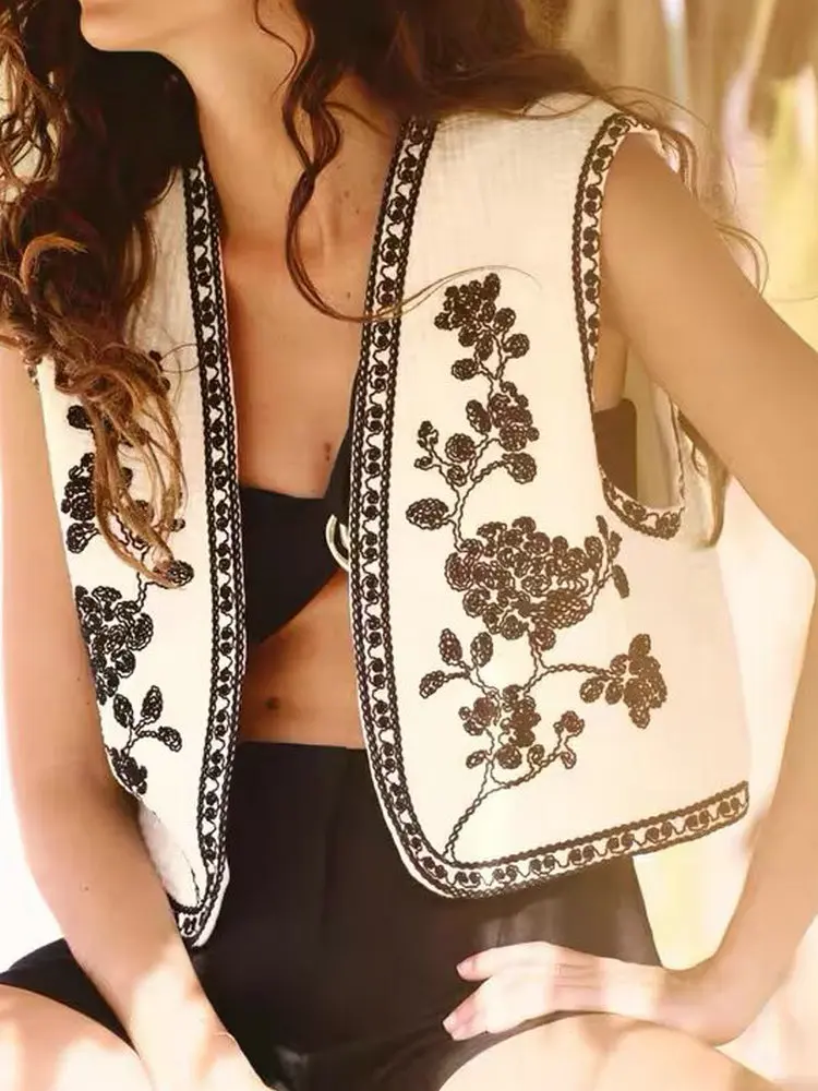 2025 Women's Vintage Floral Embroidery V-Neck Sleeveless Short Waistcoat Female Elegant Retro Chic Cardigan Vests Outerwear Tops
2025 Women's Vintage Floral Embroidery V-Neck Sleeveless Short Waistcoat Female Elegant Retro Chic Cardigan Vests Outerwear Tops
