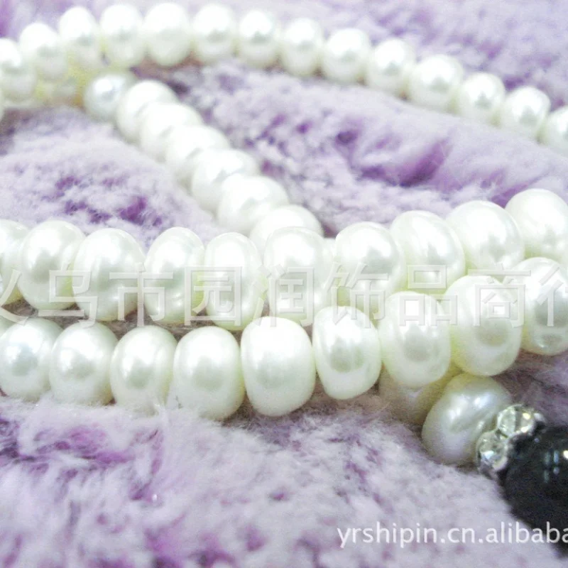 Cultured freshwater pearl necklace with three agate beads and setting,-8mm pearls
Cultured freshwater pearl necklace with three agate beads and setting,-8mm pearls