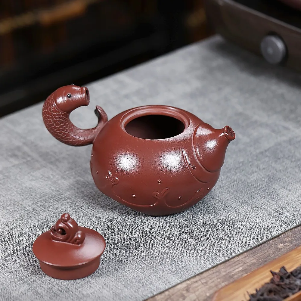 Handmade Yixing Purple Clay Pot Famous Ore Yuyue Langjian Household Kung Fu Teapot Gift Set Card Cover 330cc
Handmade Yixing Purple Clay Pot Famous Ore Yuyue Langjian Household Kung Fu Teapot Gift Set Card Cover 330cc