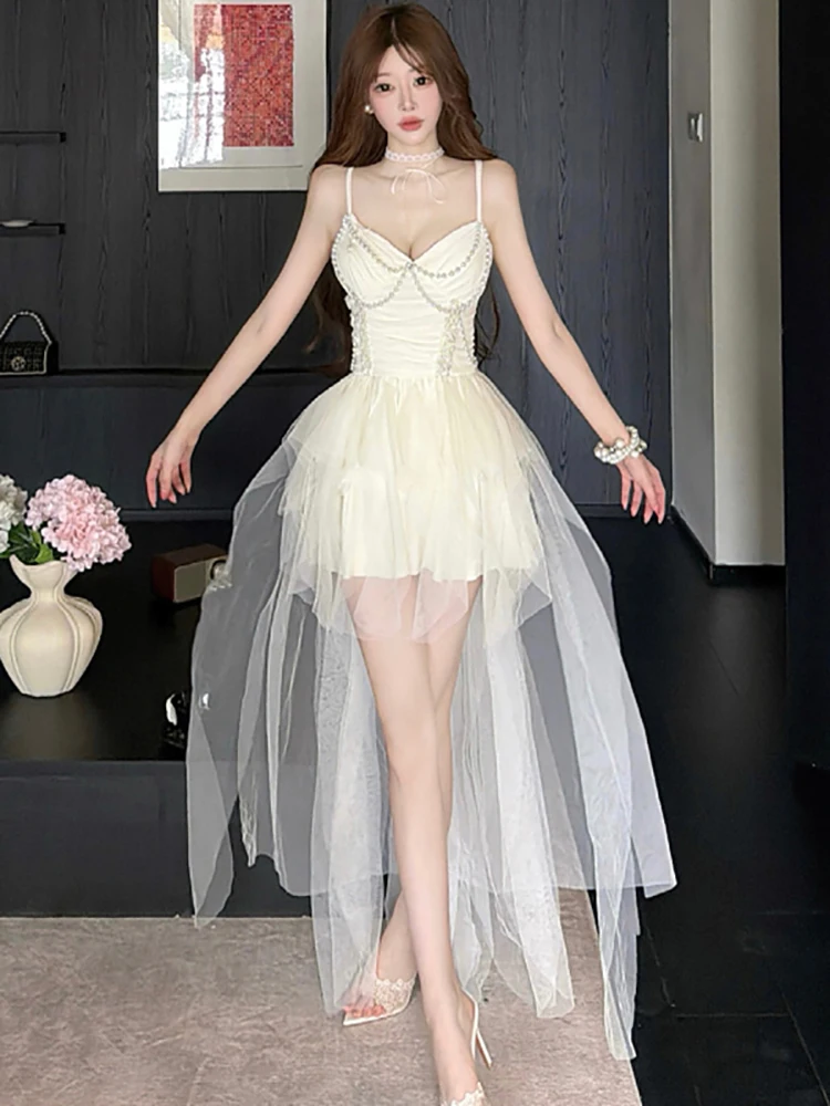 Summer White Mesh Ruffled Chic Beading Sling Dress Women Elegant Luxury Midi Dress 2026 Korean Vintage Bodycon Festival Vestidos
Summer White Mesh Ruffled Chic Beading Sling Dress Women Elegant Luxury Midi Dress 2026 Korean Vintage Bodycon Festival Vestidos