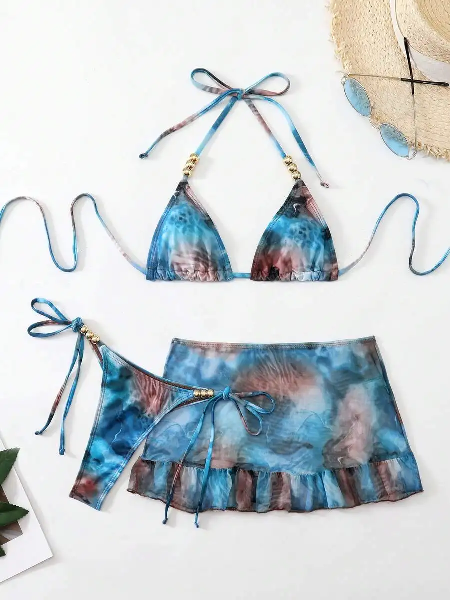 Tie-Dye Print Beaded Halter Top With Tie-Front Bottoms And Ruffled Mini Skirt Bikini Set
Tie-Dye Print Beaded Halter Top With Tie-Front Bottoms And Ruffled Mini Skirt Bikini Set