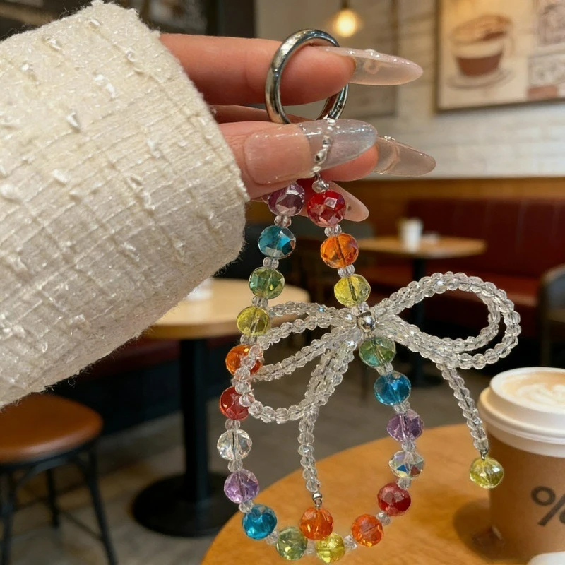Rainbow Crystal Bow Mobile Phone Pendant, High-end Short Bag Keychain Pendant.
Rainbow Crystal Bow Mobile Phone Pendant, High-end Short Bag Keychain Pendant.