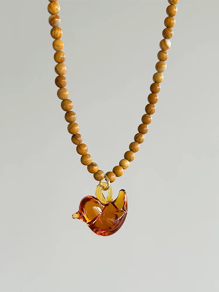 Wooden Bead Glass Bird Necklace Retro Lazy vibe girls summer Stackable neck chain accessory
Wooden Bead Glass Bird Necklace Retro Lazy vibe girls summer Stackable neck chain accessory