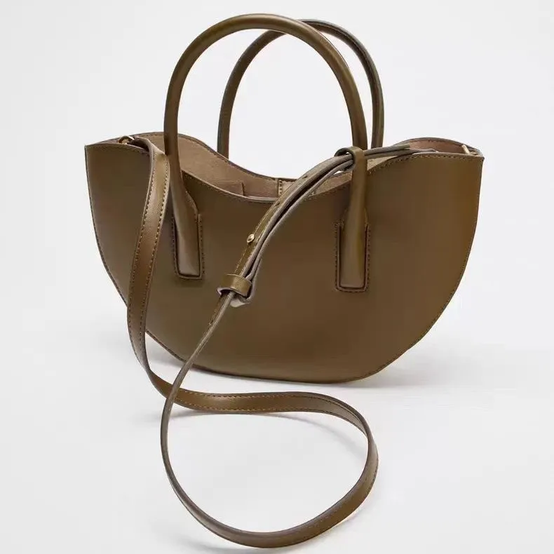 New Classic Cloud Round Handle Tote High-end Chic Designer Women Shoulder Crossbody Bag pu Leather Hand Bag
New Classic Cloud Round Handle Tote High-end Chic Designer Women Shoulder Crossbody Bag pu Leather Hand Bag