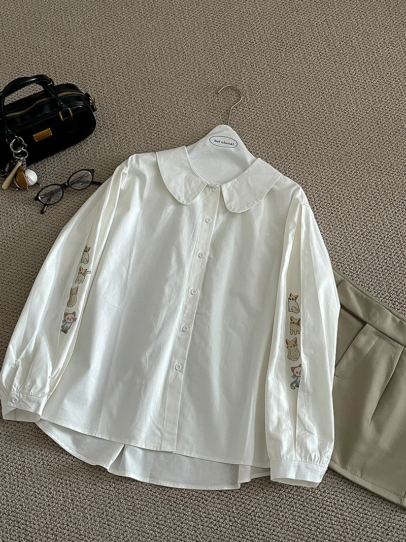 Wedbleser Pure White Doll Collar Cat Embroidery Shirt 2025 Autumn New Style Women Clothing Trendy Niche Simple Cardigan Top
Wedbleser Pure White Doll Collar Cat Embroidery Shirt 2025 Autumn New Style Women Clothing Trendy Niche Simple Cardigan Top