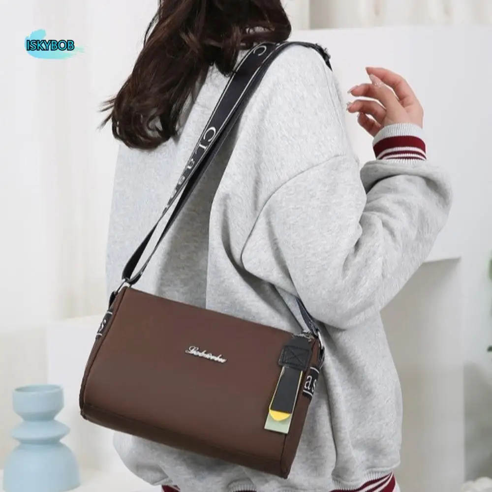Korean Style Nylon Shoulder Bag Large Capacity Underarm Bag Zipper Dumpling Bag Wide Shoulder Strap Cylindrical Bag
Korean Style Nylon Shoulder Bag Large Capacity Underarm Bag Zipper Dumpling Bag Wide Shoulder Strap Cylindrical Bag