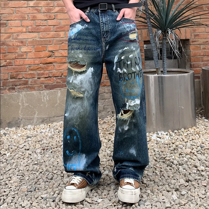 Korean Streetwear Baggy Jeans Men Hand Drawn Graffiti Washed Ripped Denim Straight Leg Pants Hip Hop Skateboard High Quality
Korean Streetwear Baggy Jeans Men Hand Drawn Graffiti Washed Ripped Denim Straight Leg Pants Hip Hop Skateboard High Quality