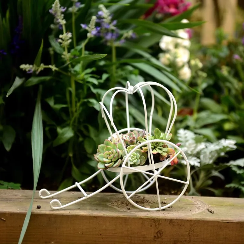 Decorative Metal Pumpkin Carriage Planter, White, 8.7x7.5 inches, Garden Plant Stand with Wheels
Decorative Metal Pumpkin Carriage Planter, White, 8.7x7.5 inches, Garden Plant Stand with Wheels