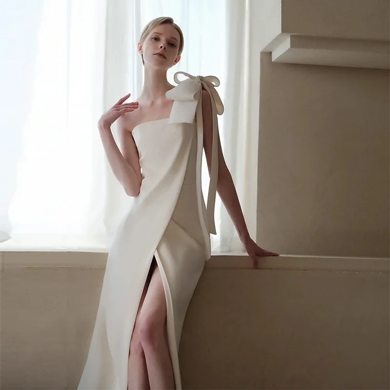 French Style Simple Wedding Dress White Satin Spaghetti Strap Bow Bridal Dresses Temperament Backless A-Line Long Formal Gown
French Style Simple Wedding Dress White Satin Spaghetti Strap Bow Bridal Dresses Temperament Backless A-Line Long Formal Gown