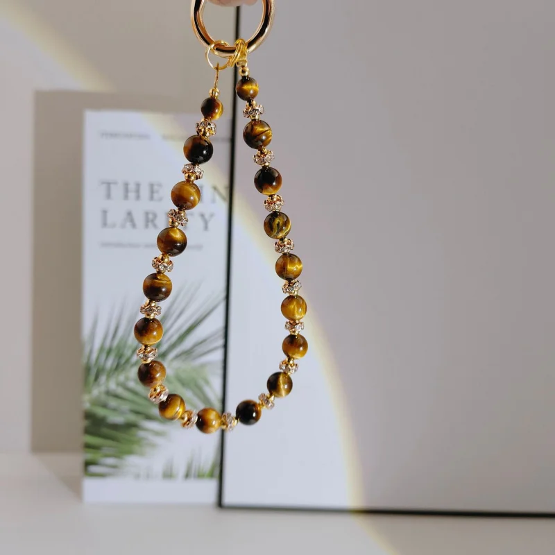 Original crystal phone chain Maillard tiger eye stone lanyard, short wrist strap, high-end pendant,vintage keychain bag decorate
Original crystal phone chain Maillard tiger eye stone lanyard, short wrist strap, high-end pendant,vintage keychain bag decorate