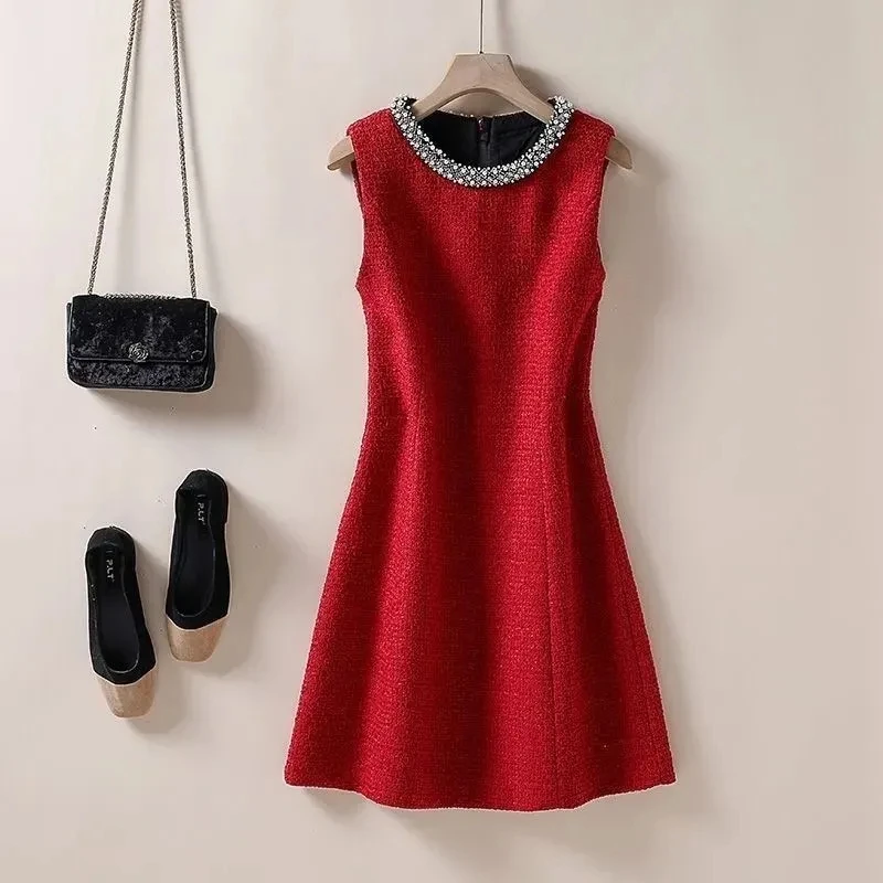 Small Fragrant style Heavy Industry Nail Bead Coarse Flower Woolen Slimming Dress 2026 Spring Autumn Women's Sleeveless Dress
Small Fragrant style Heavy Industry Nail Bead Coarse Flower Woolen Slimming Dress 2026 Spring Autumn Women's Sleeveless Dress