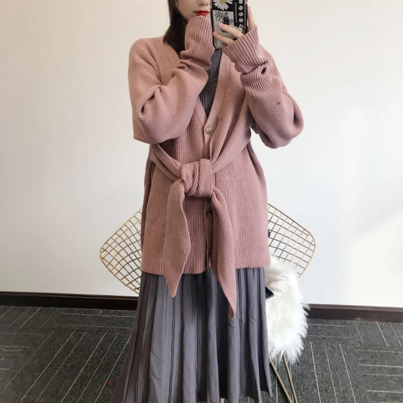 2022 Autumn Winter New Women Sweaters V Neck Bowknot Drawstring Single Breasted Knitted Cardigan Solid Loose Outerwear
2022 Autumn Winter New Women Sweaters V Neck Bowknot Drawstring Single Breasted Knitted Cardigan Solid Loose Outerwear