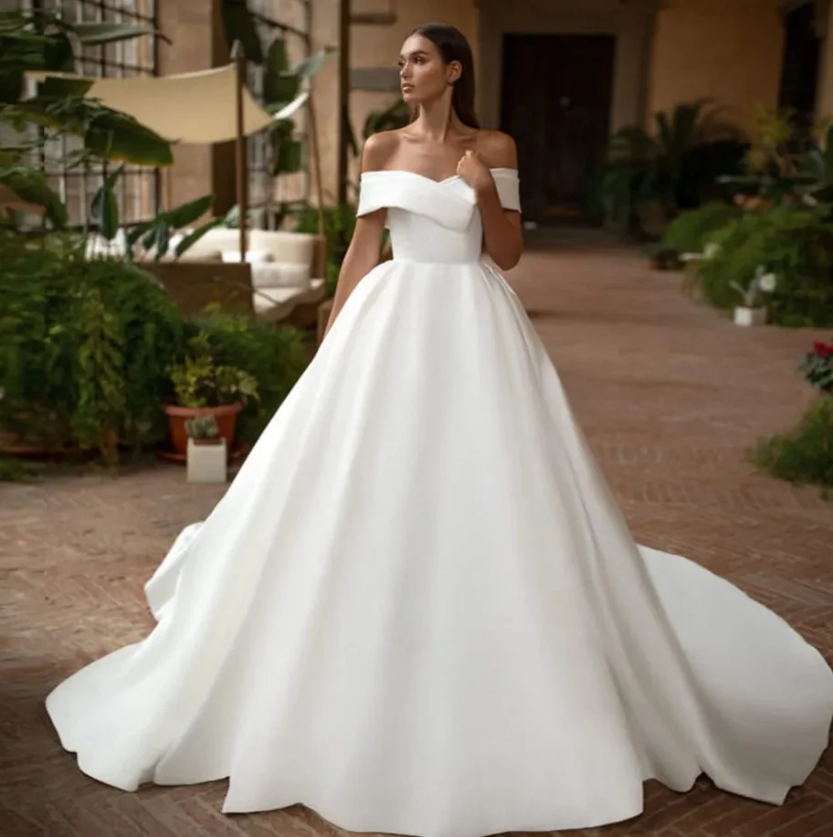Индивидуальные свадебные платья Vestido De Noiva трапециевидной формы с открытыми плечами и V-образным вырезом, атласное свадебное платье
Индивидуальные свадебные платья Vestido De Noiva трапециевидной формы с открытыми плечами и V-образным вырезом, атласное свадебное платье