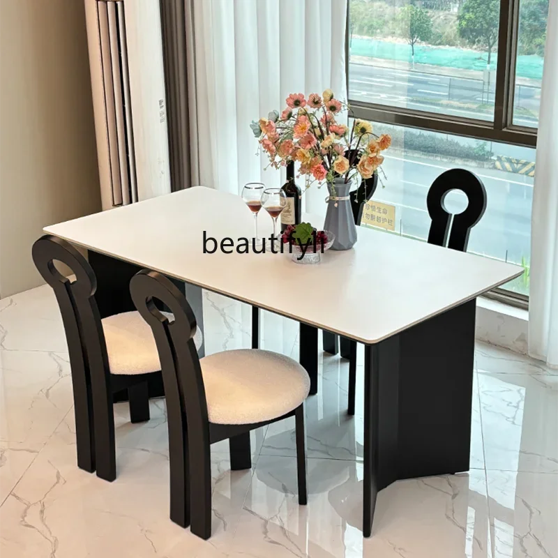 Cream wind medium and ancient dining table household solid wood rock slab light luxury simple modern rectangular French chair
Cream wind medium and ancient dining table household solid wood rock slab light luxury simple modern rectangular French chair