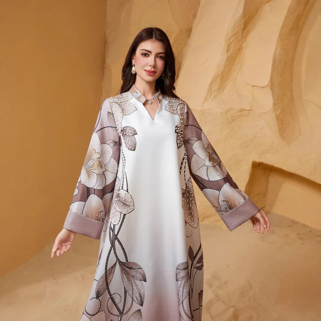 Middle Eastern Muslim Women's Robes: Printed Dresses with Beaded and Rhinestone Embellishments, V-neckline and Turn-up Sleeves.
Middle Eastern Muslim Women's Robes: Printed Dresses with Beaded and Rhinestone Embellishments, V-neckline and Turn-up Sleeves.