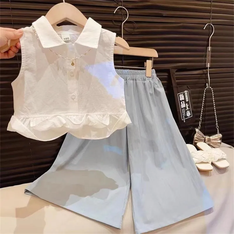 Girls Summer Fashion Sleeveless Cotton Shirt And Wide Leg Pants Two Piece Set Elegant Design Sense Airy Feel Perfect for Sun ...
Girls Summer Fashion Sleeveless Cotton Shirt And Wide Leg Pants Two Piece Set Elegant Design Sense Airy Feel Perfect for Sun ...