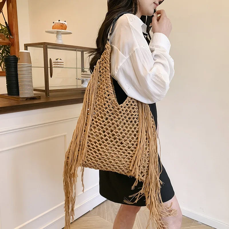 2025 Summer Tassel Shoulder Bags Hollow Out Weaving Tote Bags For Women Luxury Beach Vacation Handbags Travel Shoulder Bag
2025 Summer Tassel Shoulder Bags Hollow Out Weaving Tote Bags For Women Luxury Beach Vacation Handbags Travel Shoulder Bag