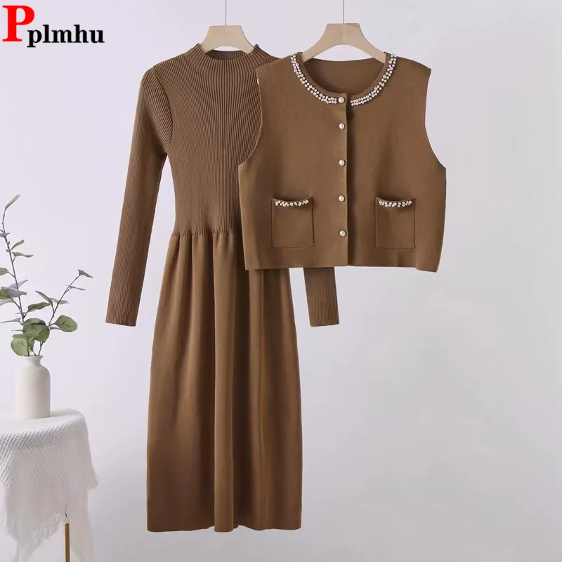 Корейский дизайн, новые вязаные комплекты из 2 предметов, осень-зима, элегантный короткий жилет с круглым вырезом и бисером, топы, длинное платье трапециевидной формы Conjuntos, наряд
Корейский дизайн, новые вязаные комплекты из 2 предметов, осень-зима, элегантный короткий жилет с круглым вырезом и бисером, топы, длинное платье трапециевидной формы Conjuntos, наряд