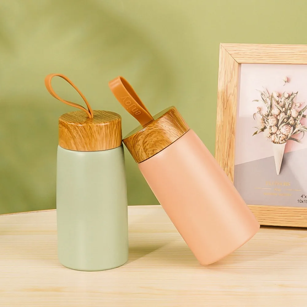 280ML Wood Grain Thermal Cup Double Wall 304 Stainless Steel Vacuum Flask with Rubber Rope Mini Insulated Water Bottle Students
280ML Wood Grain Thermal Cup Double Wall 304 Stainless Steel Vacuum Flask with Rubber Rope Mini Insulated Water Bottle Students