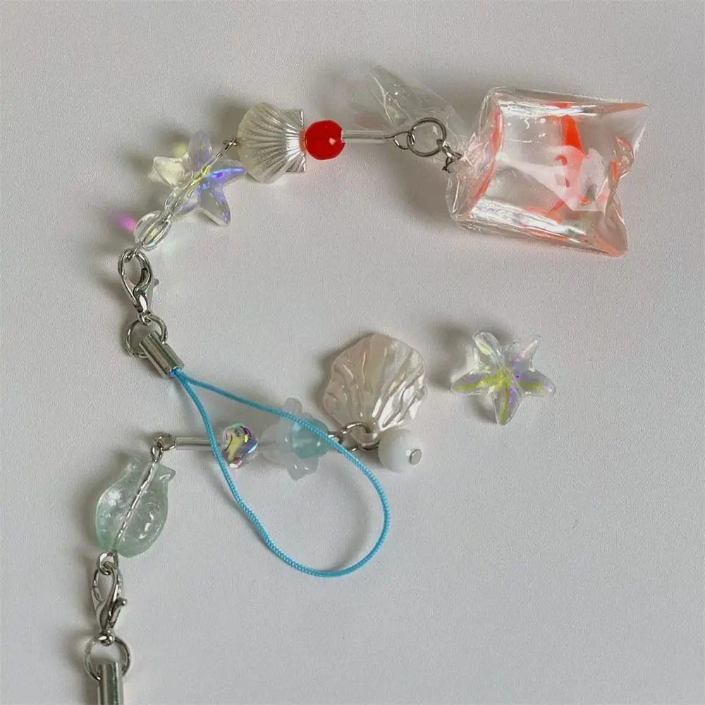 Эстетический ремешок для телефона с золотой рыбкой Y2k в океанском стиле, ремешок для телефона с рыбой ручной работы, милый кавайный бисер, мобильная цепочка для ключей
Эстетический ремешок для телефона с золотой рыбкой Y2k в океанском стиле, ремешок для телефона с рыбой ручной работы, милый кавайный бисер, мобильная цепочка для ключей