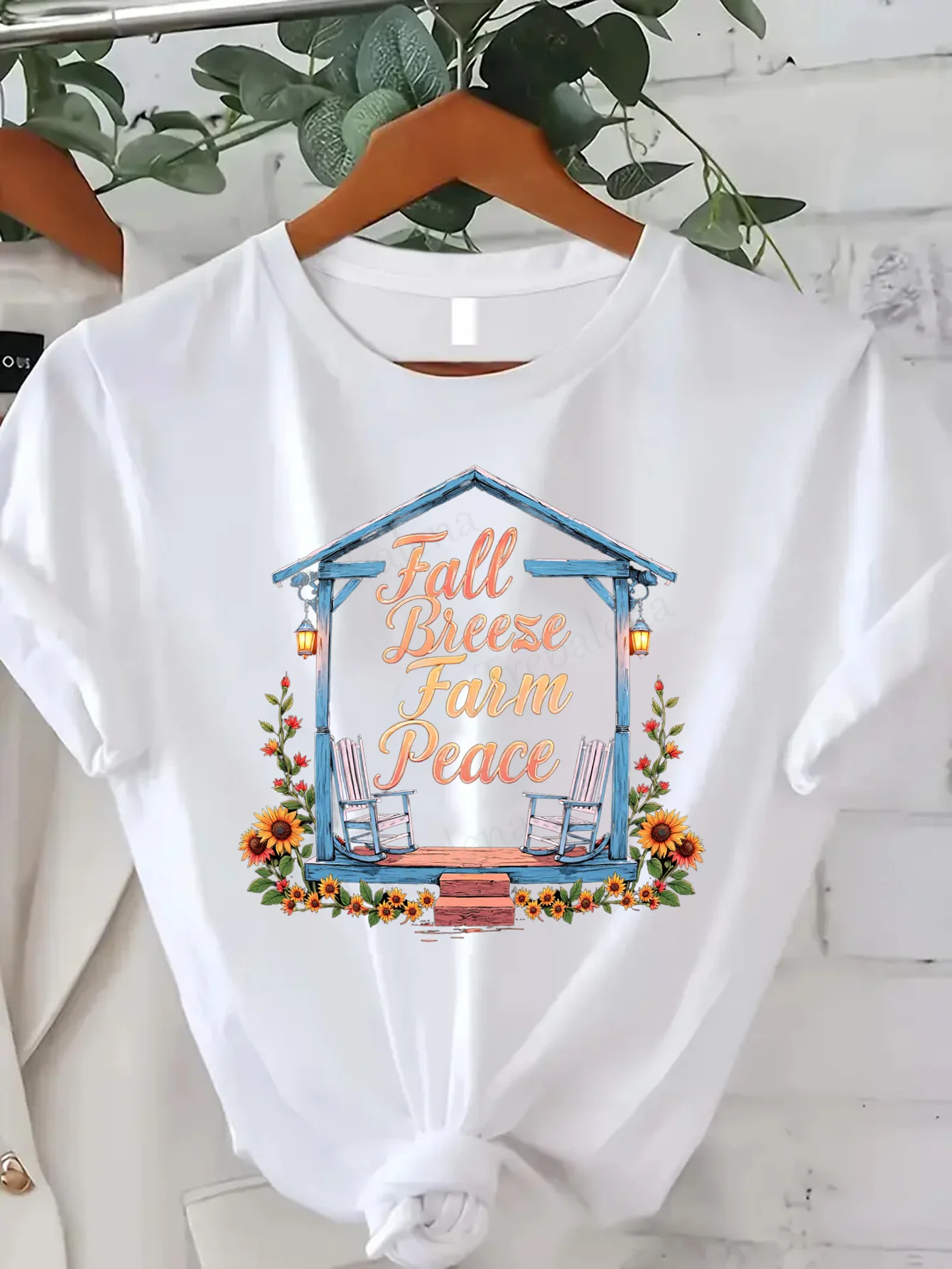 Comfortable Women's Print T-shirt "Fall Breeze Farm Peace T-Shirt - Cozy Porch Scene with Sunflowers"
Comfortable Women's Print T-shirt "Fall Breeze Farm Peace T-Shirt - Cozy Porch Scene with Sunflowers"