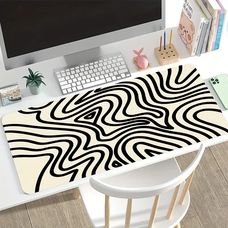 A Large Gaming Mouse Pad Featuring an Abstract Black And White Maze Design, with a Non-Slip, Washable Rubber Base.
A Large Gaming Mouse Pad Featuring an Abstract Black And White Maze Design, with a Non-Slip, Washable Rubber Base.
