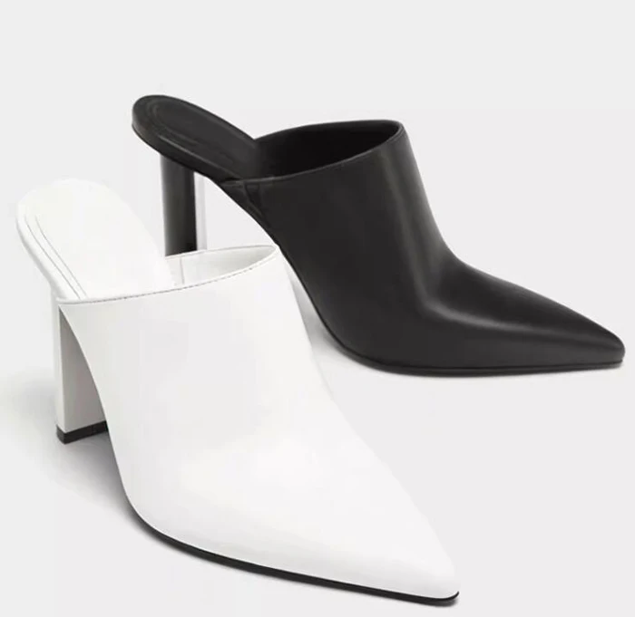 Элегантные черно-белые кожаные туфли-мюли с острым носком, на массивном высоком каблуке, с ремешком сзади, без застежки
Элегантные черно-белые кожаные туфли-мюли с острым носком, на массивном высоком каблуке, с ремешком сзади, без застежки