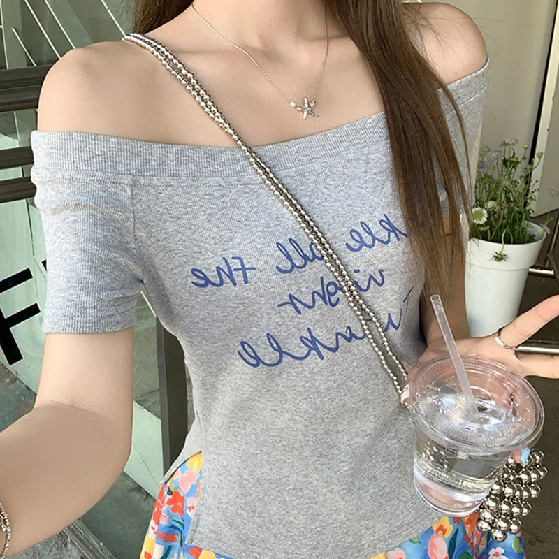 Fashion Letter Printed Off Shoulder Tshirt Women Summer 2025 Side Split Short Sleeve T Shirts Woman Korean Slim Fit Tshirts
Fashion Letter Printed Off Shoulder Tshirt Women Summer 2025 Side Split Short Sleeve T Shirts Woman Korean Slim Fit Tshirts