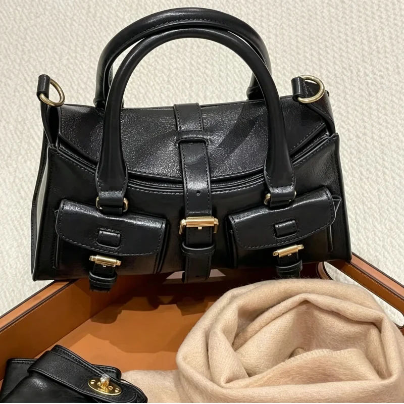 Brand Luxury Metal Buckle Soft Leather Handbag Retro Multi Pocket Large Capacity Top Handle Single Shoulder Sloping Backpack New
Brand Luxury Metal Buckle Soft Leather Handbag Retro Multi Pocket Large Capacity Top Handle Single Shoulder Sloping Backpack New