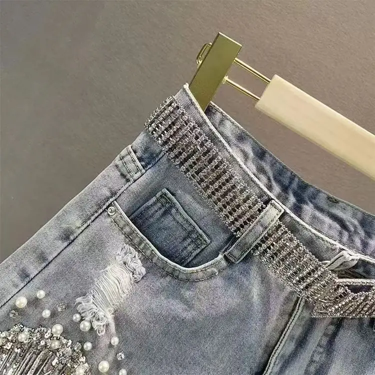 Summer Elegant Shorts Lady Tassel Beading High Waist Wide Leg Denim Shorts Female Casual Solid Shorts Jeans for Women Clothing
Summer Elegant Shorts Lady Tassel Beading High Waist Wide Leg Denim Shorts Female Casual Solid Shorts Jeans for Women Clothing