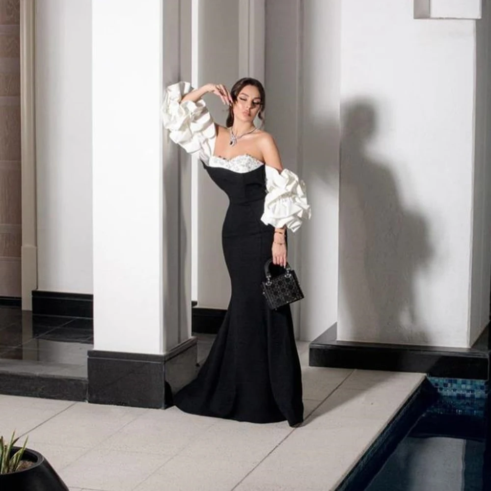 Customized Strapless Black Jersey Mermaid Flower Evening Dresses White Puff Sleeves Sexy Backless Floor Length Party Gown
Customized Strapless Black Jersey Mermaid Flower Evening Dresses White Puff Sleeves Sexy Backless Floor Length Party Gown