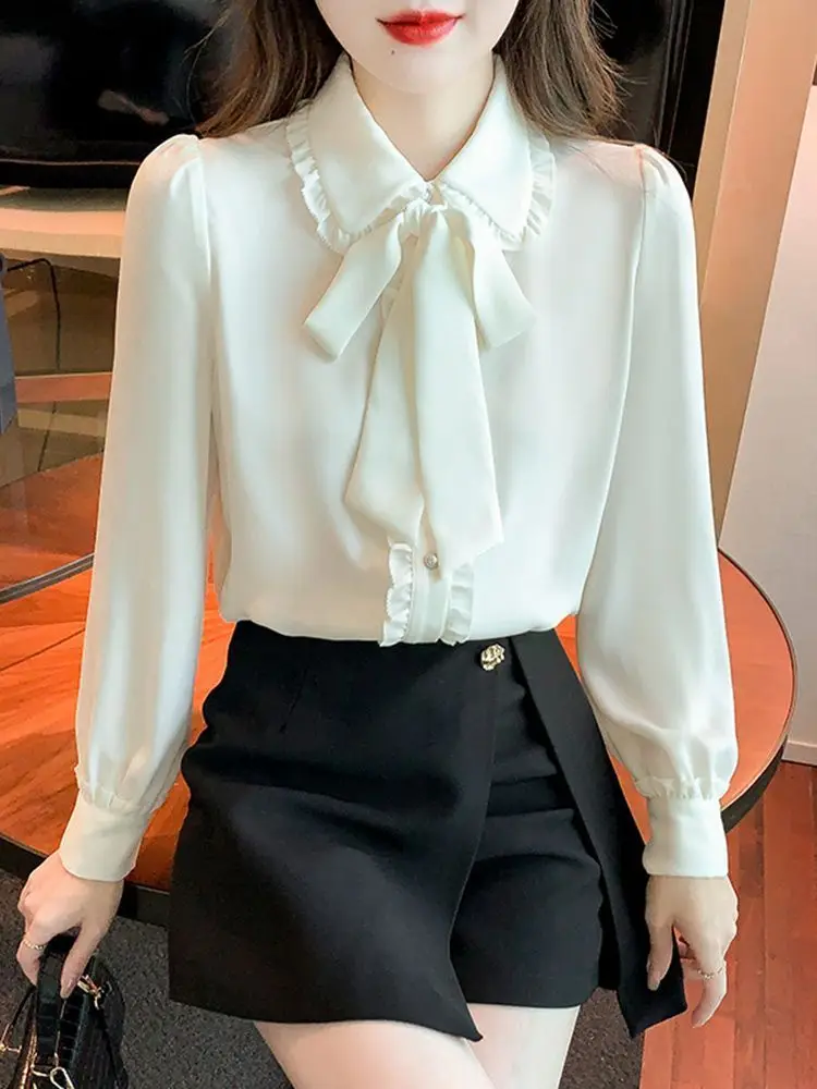 Женская блузка с бантом, оборками и пуговицами, свободного кроя, универсальная, весна-осень, новая модная белая блузка с длинным рукавом, однотонная.
Женская блузка с бантом, оборками и пуговицами, свободного кроя, универсальная, весна-осень, новая модная белая блузка с длинным рукавом, однотонная.