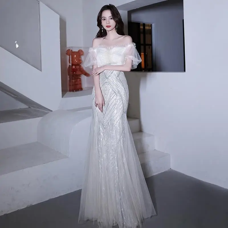 Elegant White Women's Prom Gown Luxury Off-shoulder Sequins Tulle Floor Length Wedding Party Evening Dresses Slim Fishtail Dress
Elegant White Women's Prom Gown Luxury Off-shoulder Sequins Tulle Floor Length Wedding Party Evening Dresses Slim Fishtail Dress