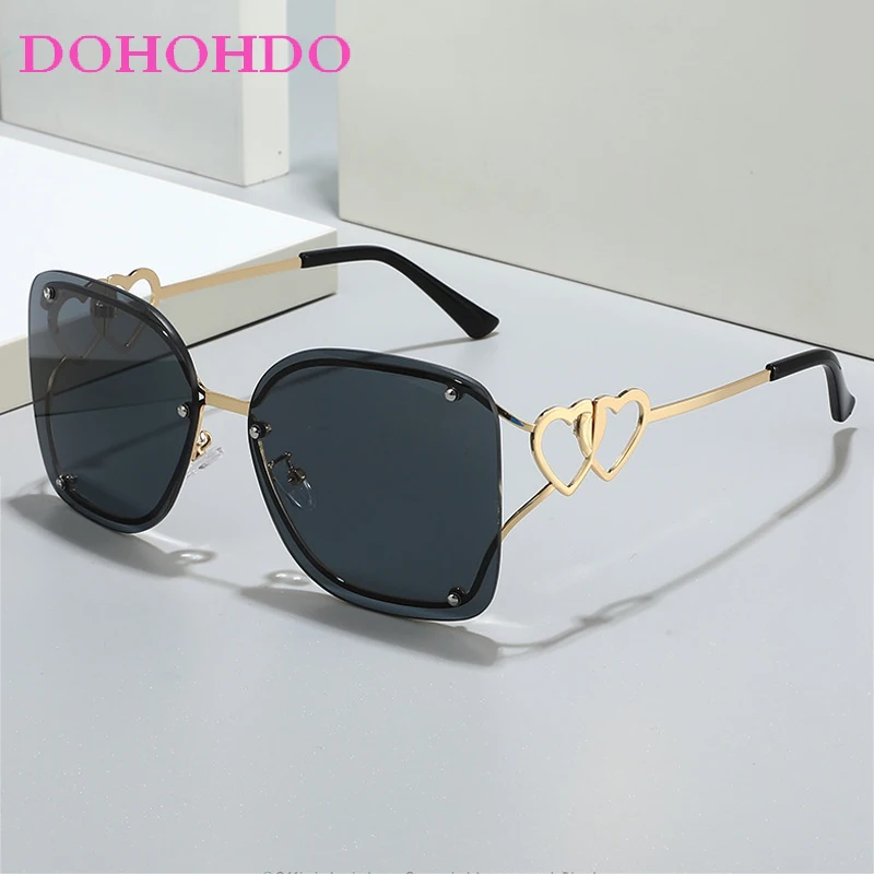 Vintage Brand Designer Rimless Sunglasses Women Men Fashion Personality Double Heart Metal Shades Outdoors Driving Glasses UV400
Vintage Brand Designer Rimless Sunglasses Women Men Fashion Personality Double Heart Metal Shades Outdoors Driving Glasses UV400