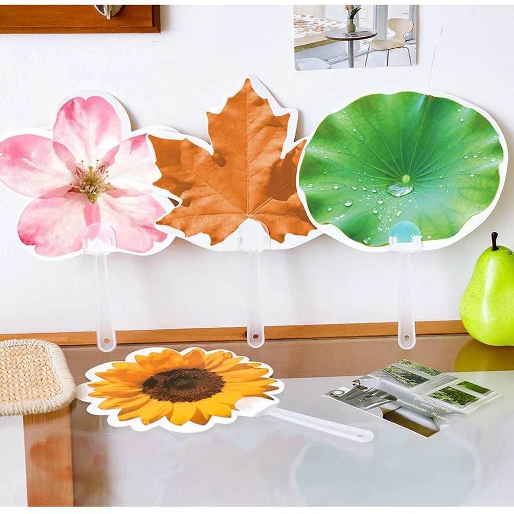 Irregular Shaped PP Handheld Fan Double Sided Printed Portable Cooling Fan for Summer Outdoor Daily Use
Irregular Shaped PP Handheld Fan Double Sided Printed Portable Cooling Fan for Summer Outdoor Daily Use