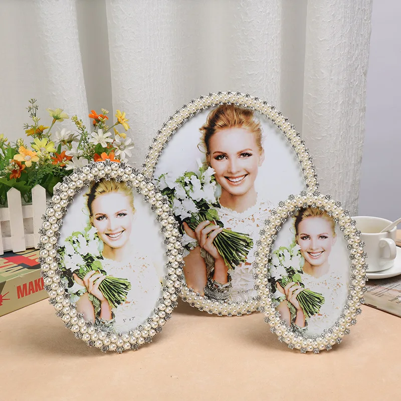 European Simple Fashion Pearl Metal Photo Frame Home Decoration Pieces
European Simple Fashion Pearl Metal Photo Frame Home Decoration Pieces