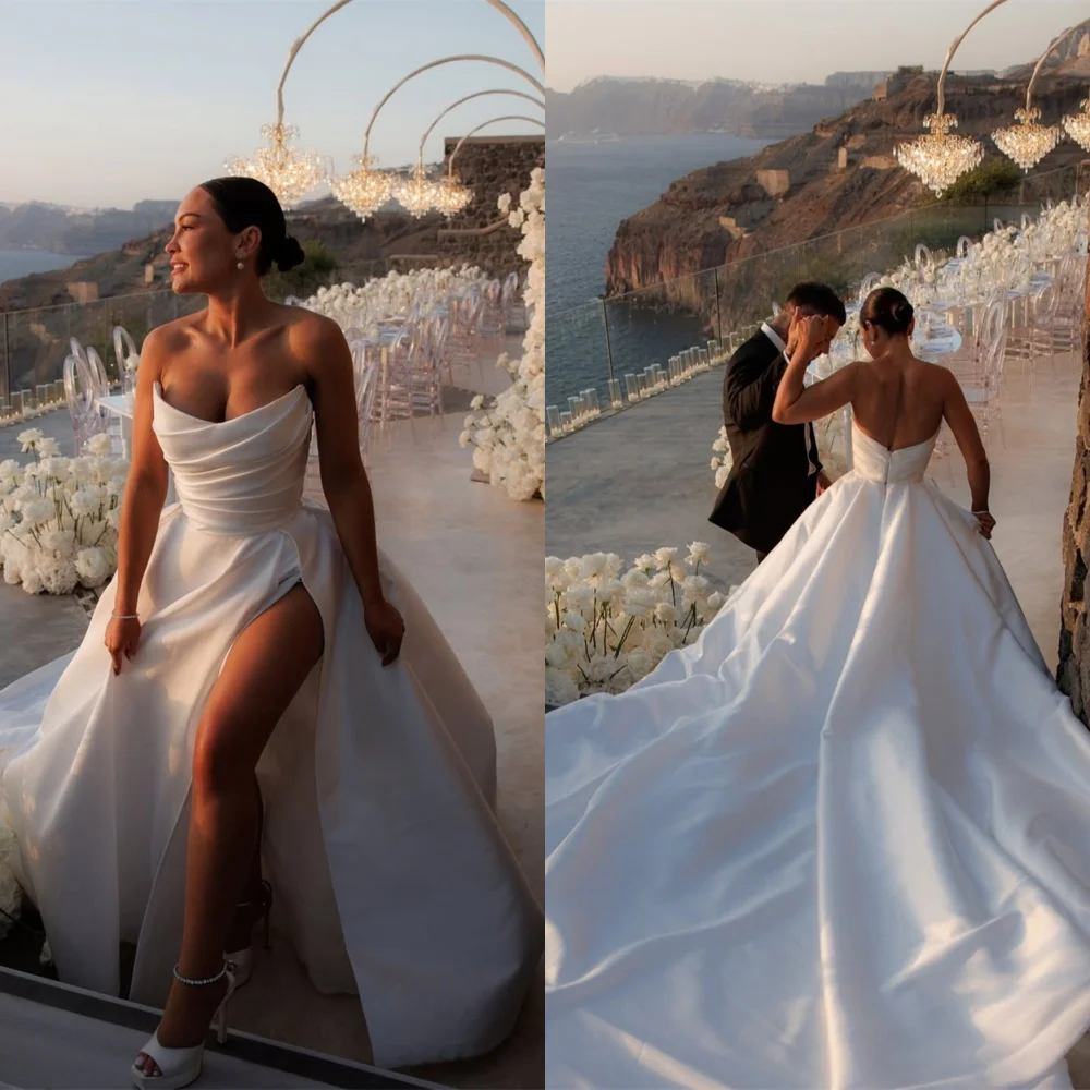 Customized High Quality White Satin Wedding Dress Exquisite Strapless Sleeveless Bridal Gowns Chapel Train Backless Dress 
Customized High Quality White Satin Wedding Dress Exquisite Strapless Sleeveless Bridal Gowns Chapel Train Backless Dress