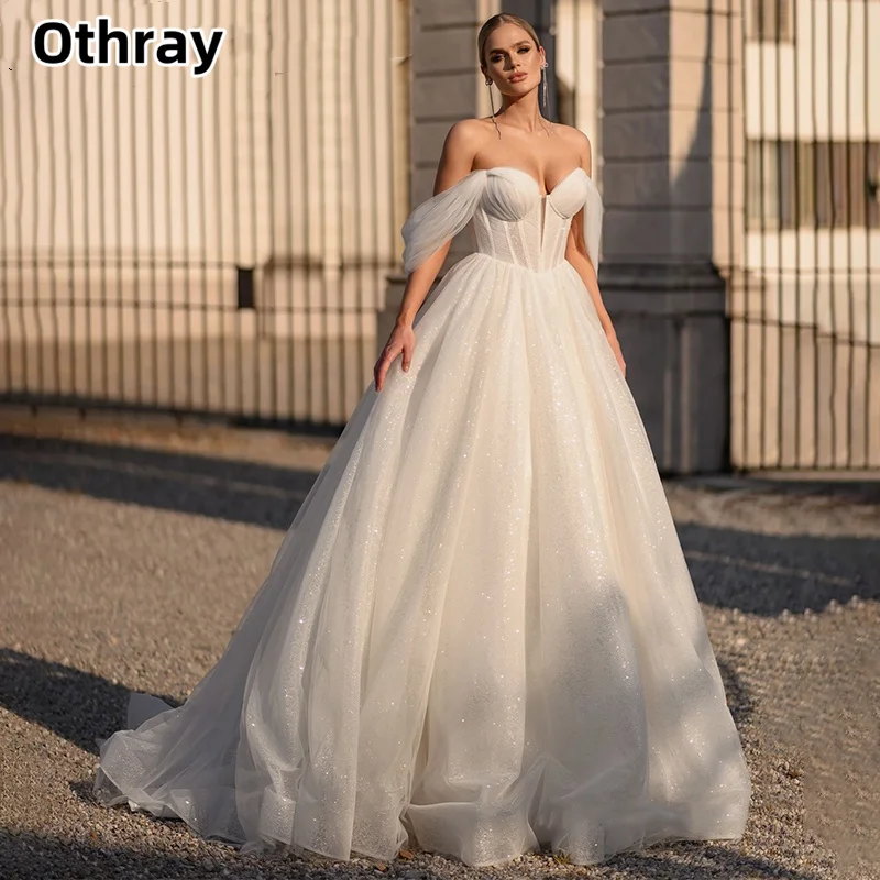Othray Glitter Wedding Dress A-line Charming Ruffled Off the Shoulder Corset Sweep Train Bridal Gown For Women robe de mariée
Othray Glitter Wedding Dress A-line Charming Ruffled Off the Shoulder Corset Sweep Train Bridal Gown For Women robe de mariée