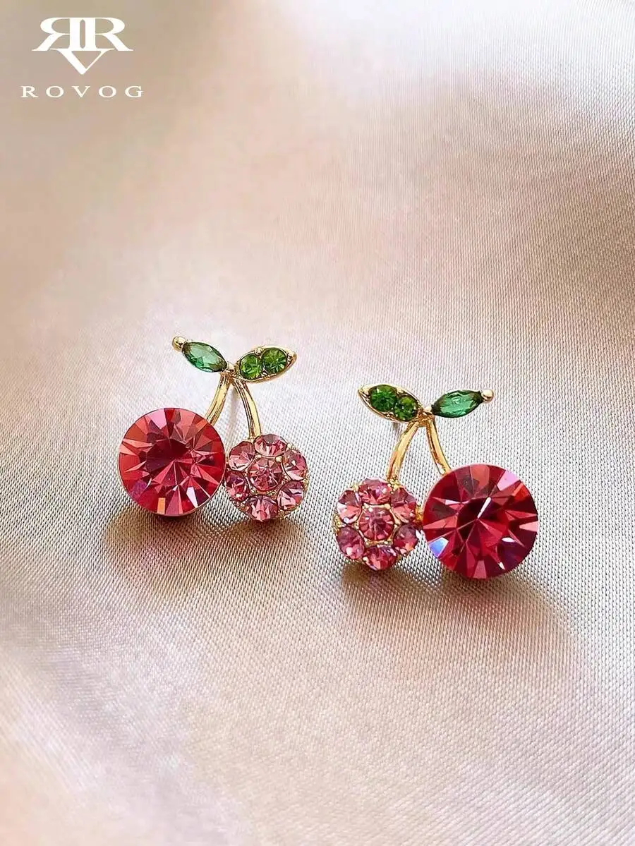 Cherry-Shaped Stud Earrings Featuring Faceted Red Crystals And Pink Crystal Cluster With Green Leaf Accents
Cherry-Shaped Stud Earrings Featuring Faceted Red Crystals And Pink Crystal Cluster With Green Leaf Accents