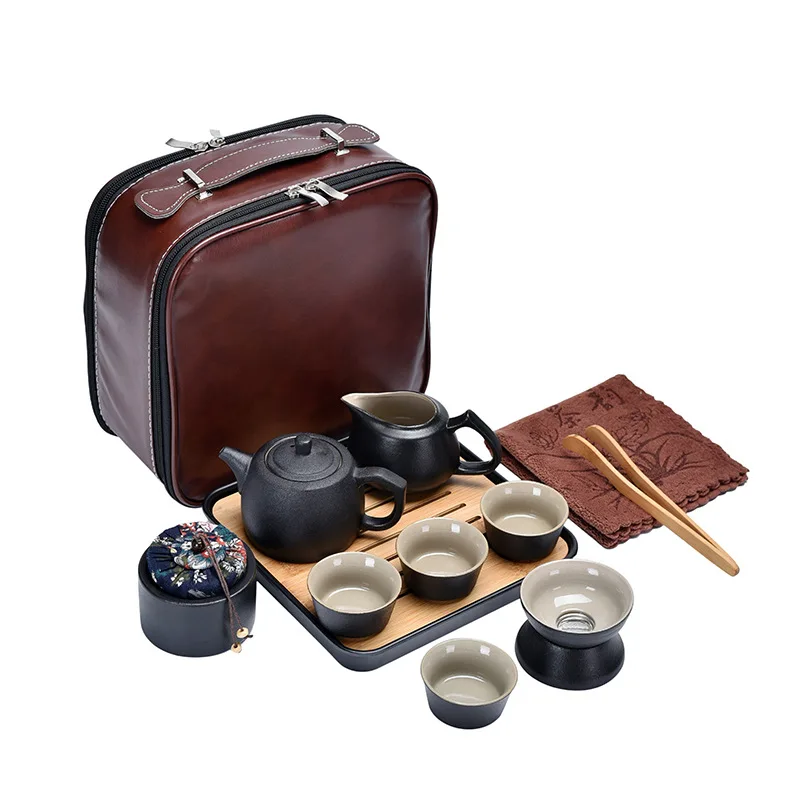 Portable Japanese black pottery travel tea set for outdoor camping, one pot of four cups, simple kung fu tea set, business gifts
Portable Japanese black pottery travel tea set for outdoor camping, one pot of four cups, simple kung fu tea set, business gifts