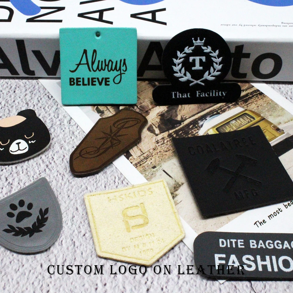 custom gold foiled logo pu leather labels for clothing print brand microfiber leather sewing label for scarf
custom gold foiled logo pu leather labels for clothing print brand microfiber leather sewing label for scarf