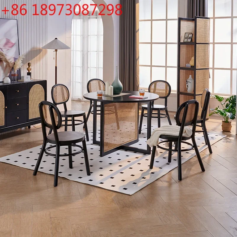 Nordic rattan solid wood dining table black small apartment simple hotel restaurant dining chair round table combination
Nordic rattan solid wood dining table black small apartment simple hotel restaurant dining chair round table combination