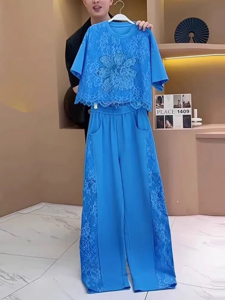 European Style Blue Sports Set Women's Summer 2025 New Fashion Hot Diamond Lace Splicing Short Sleeve Pants Two piece Set
European Style Blue Sports Set Women's Summer 2025 New Fashion Hot Diamond Lace Splicing Short Sleeve Pants Two piece Set